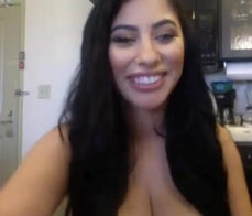  A busty webcammer puts on a show 