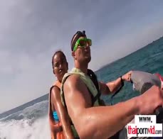Amateur Thai teen Cherry sucking a big white cock on a jet ski outdoor