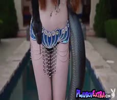 Redhead snake charmer beauty Jessica Lynette Brooks posing nude outdoor