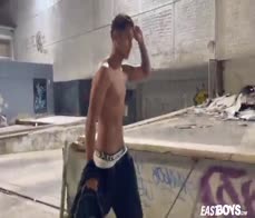 Slim tattooed boy gets a handjob to his big dick