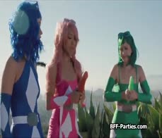 Defeated superheros sharing dildo and dick