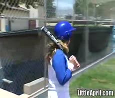 Little April rubbing her pussy at baseball field