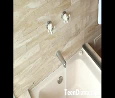 Teen lesbian takes a bath with her GF