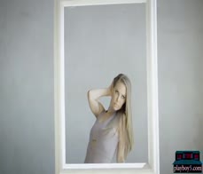 Hot MILF blonde Nicole Aniston gives a sensual striptease for Playboy