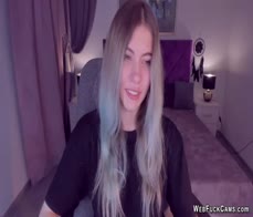 Blonde teen SimaDark smoking vape and stripping off on solo webcam show